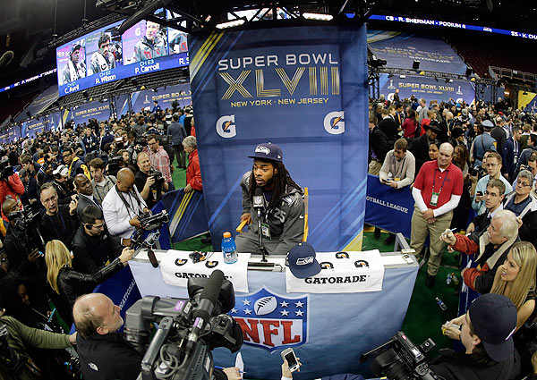 Richard Sherman doesn't want to overshadow his teammates in advance of the Super Bowl.